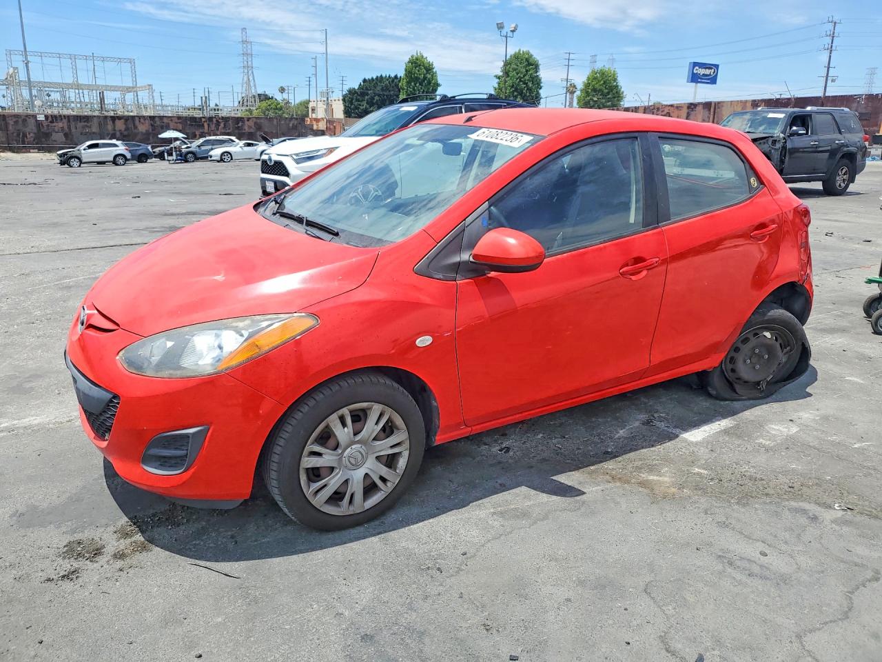 2014 Mazda 2 Sport, VIN JM1DE1KZ2E0173532 — Rear end