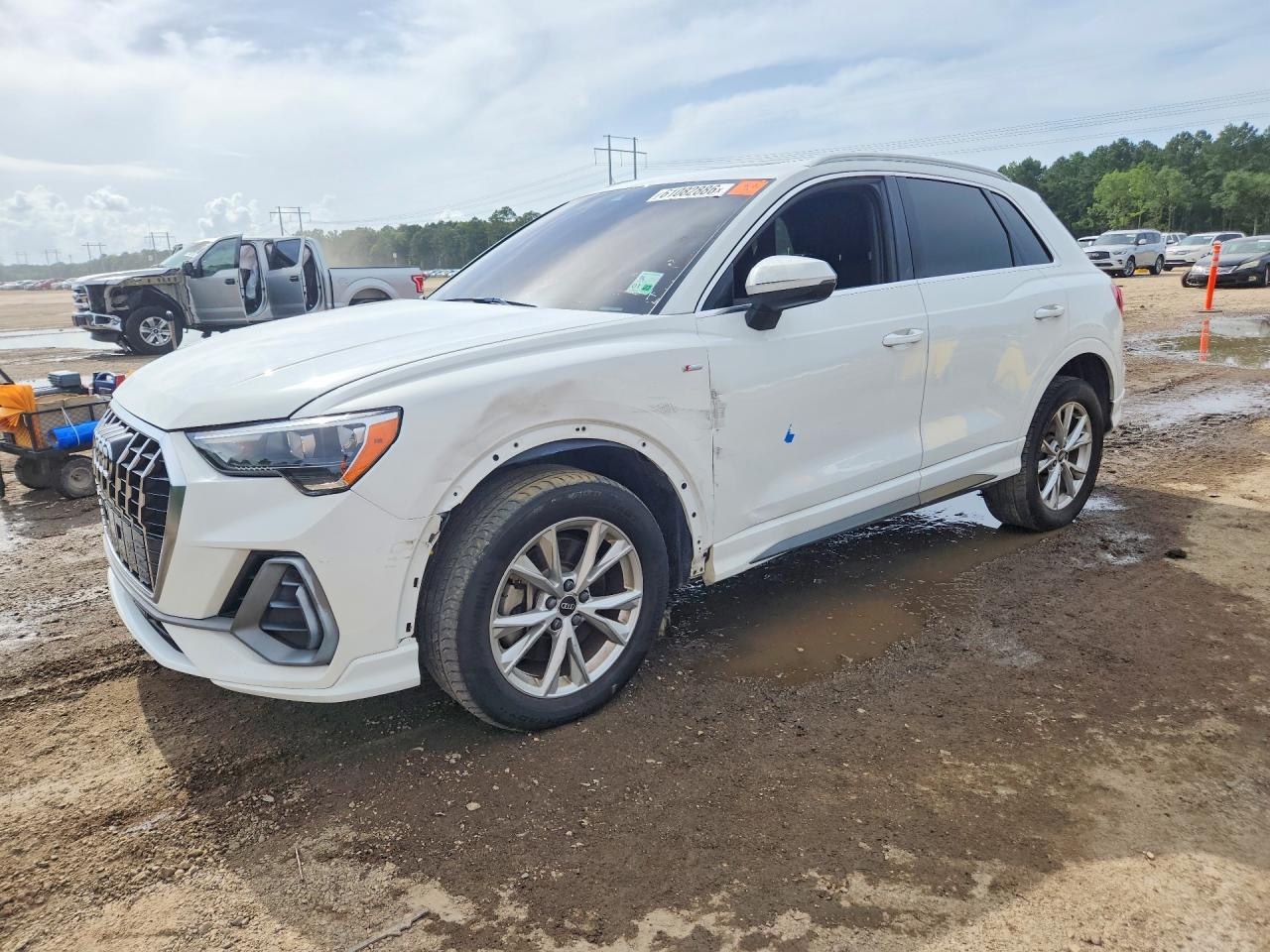 2021 Audi Q3 S line Premium, VIN WA1DECF37M1016034 — Side