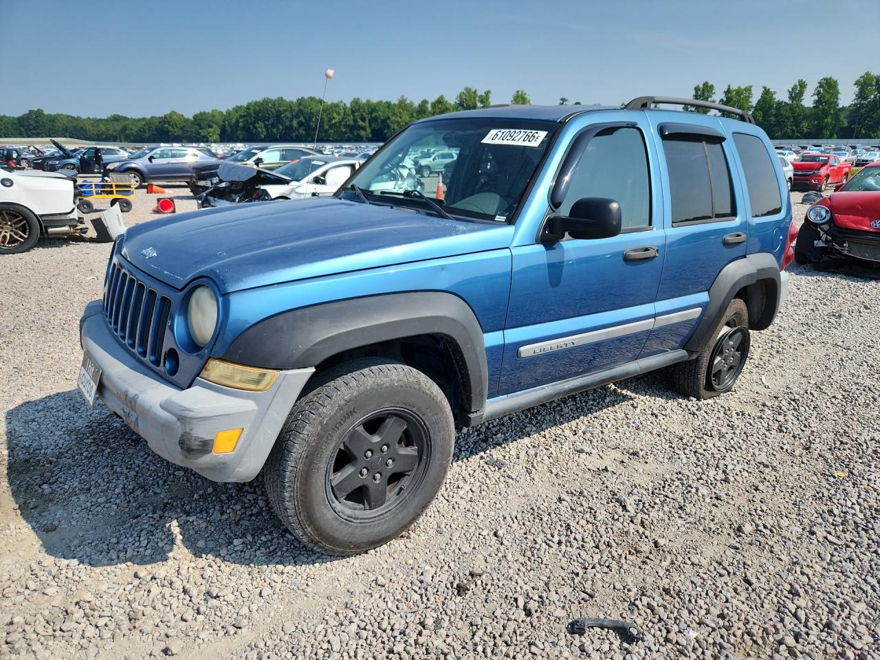 2006 Jeep Liberty Sport, VIN 1J4GK48K86W129464 — Side