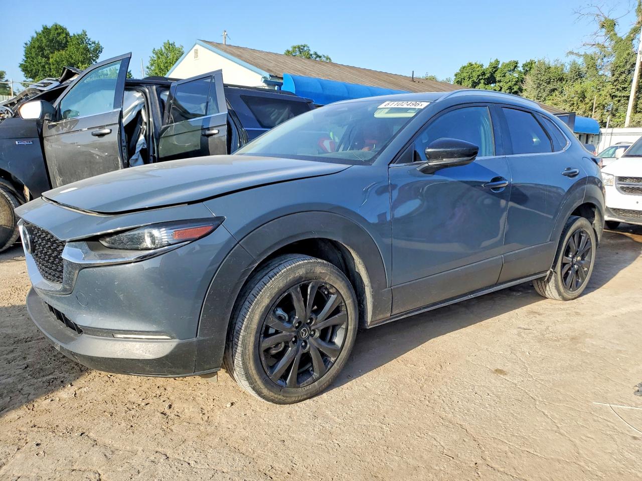 2024 Mazda CX-30 S Preferred, VIN 3MVDMBCM8RM646802 — Hail