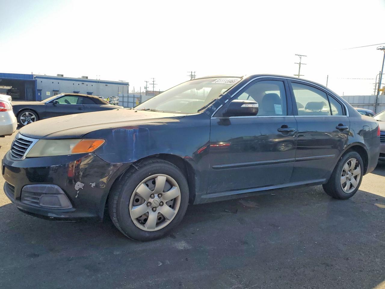 2010 Kia Optima LX, VIN KNAGG4A83A5381222 — Зад