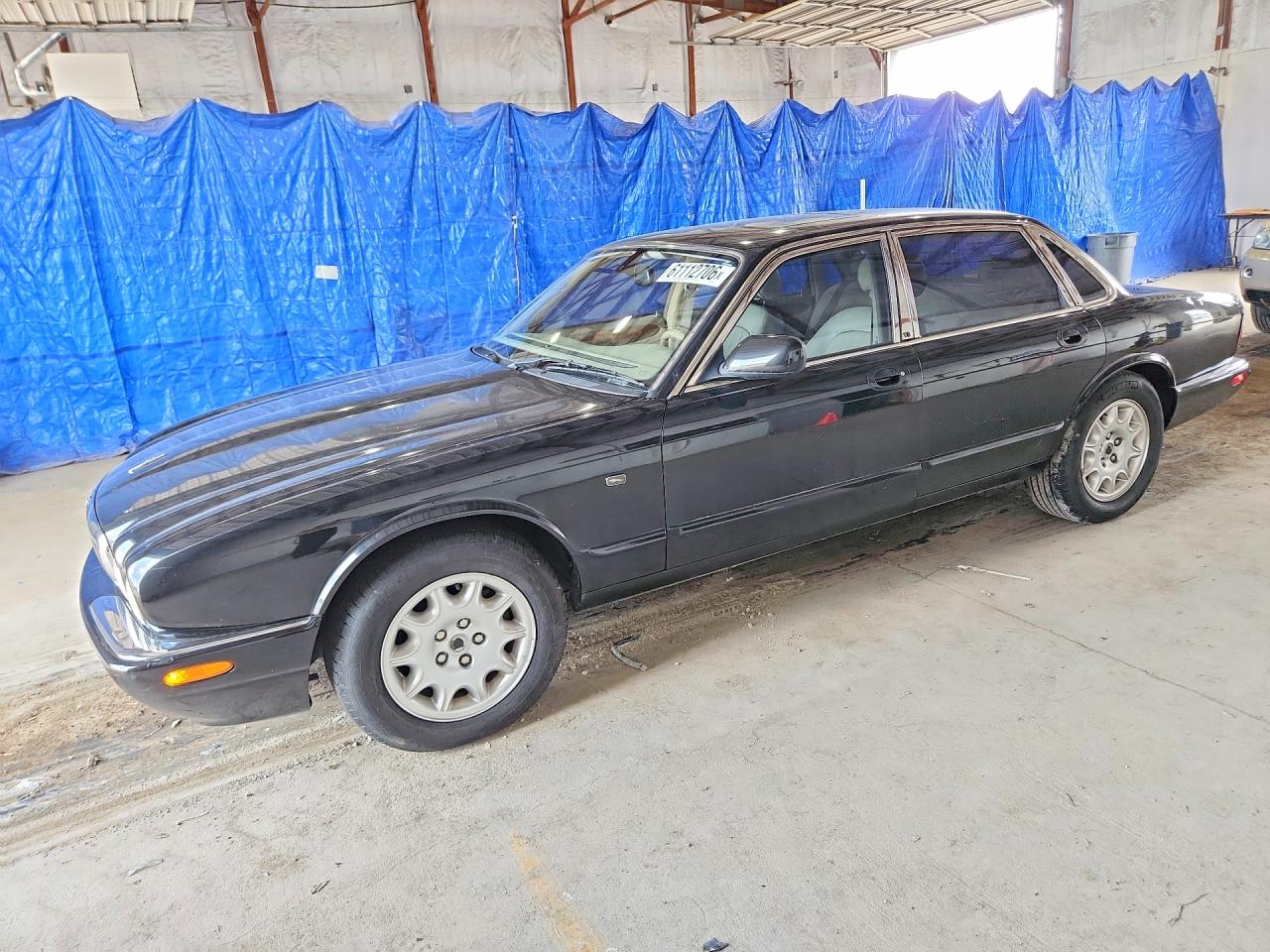 2003 Jaguar XJ 8, VIN SAJDA14C33LF52639 — Rear end