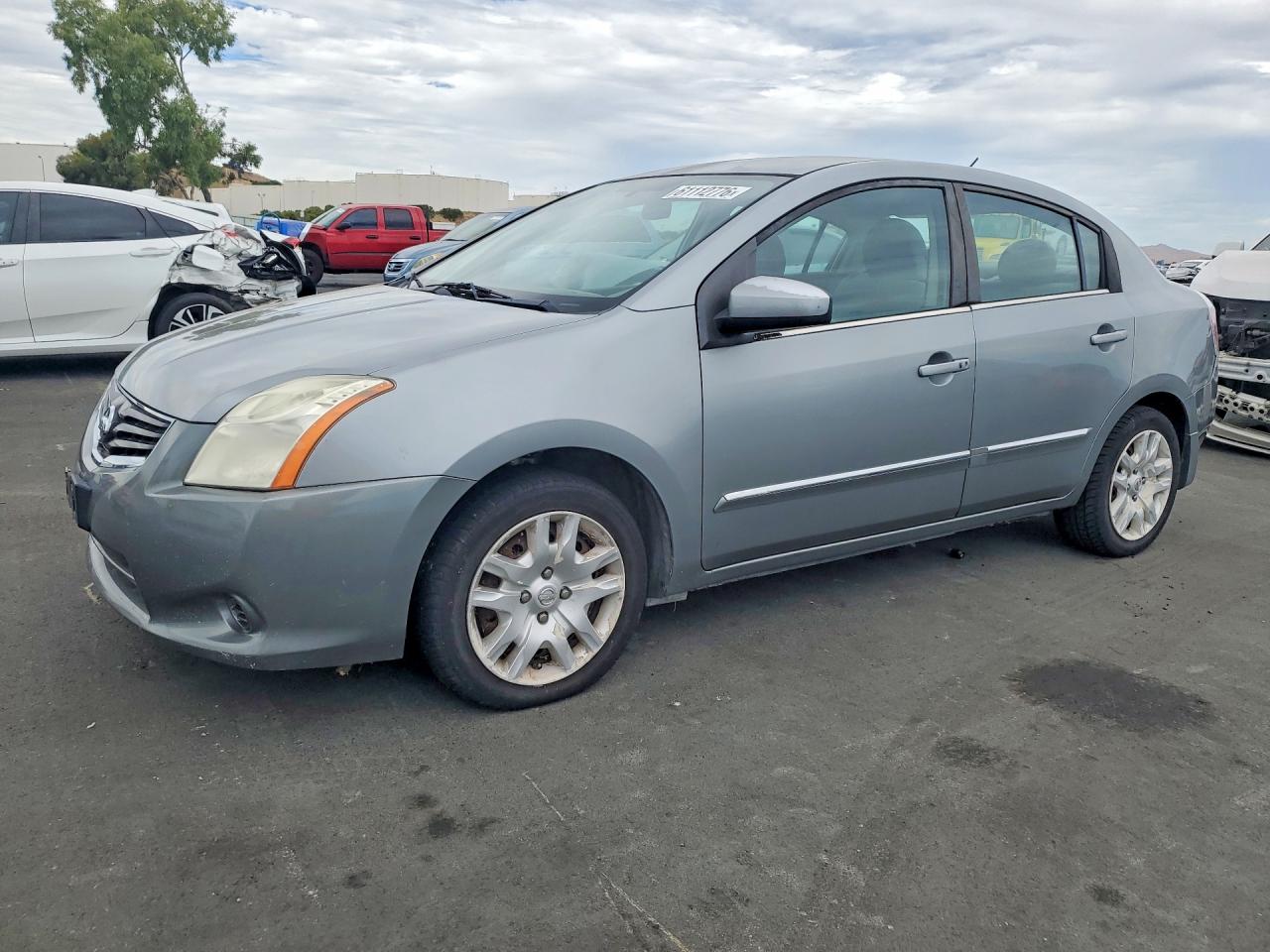 2010 Nissan Sentra 2.0, VIN 3N1AB6AP9AL709983 — Мелкие вмятины и царапины