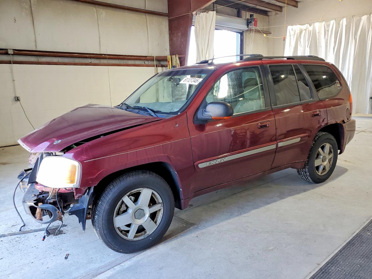 2005 GMC Envoy SLT, VIN 1GKDT13S252182179 — Front end