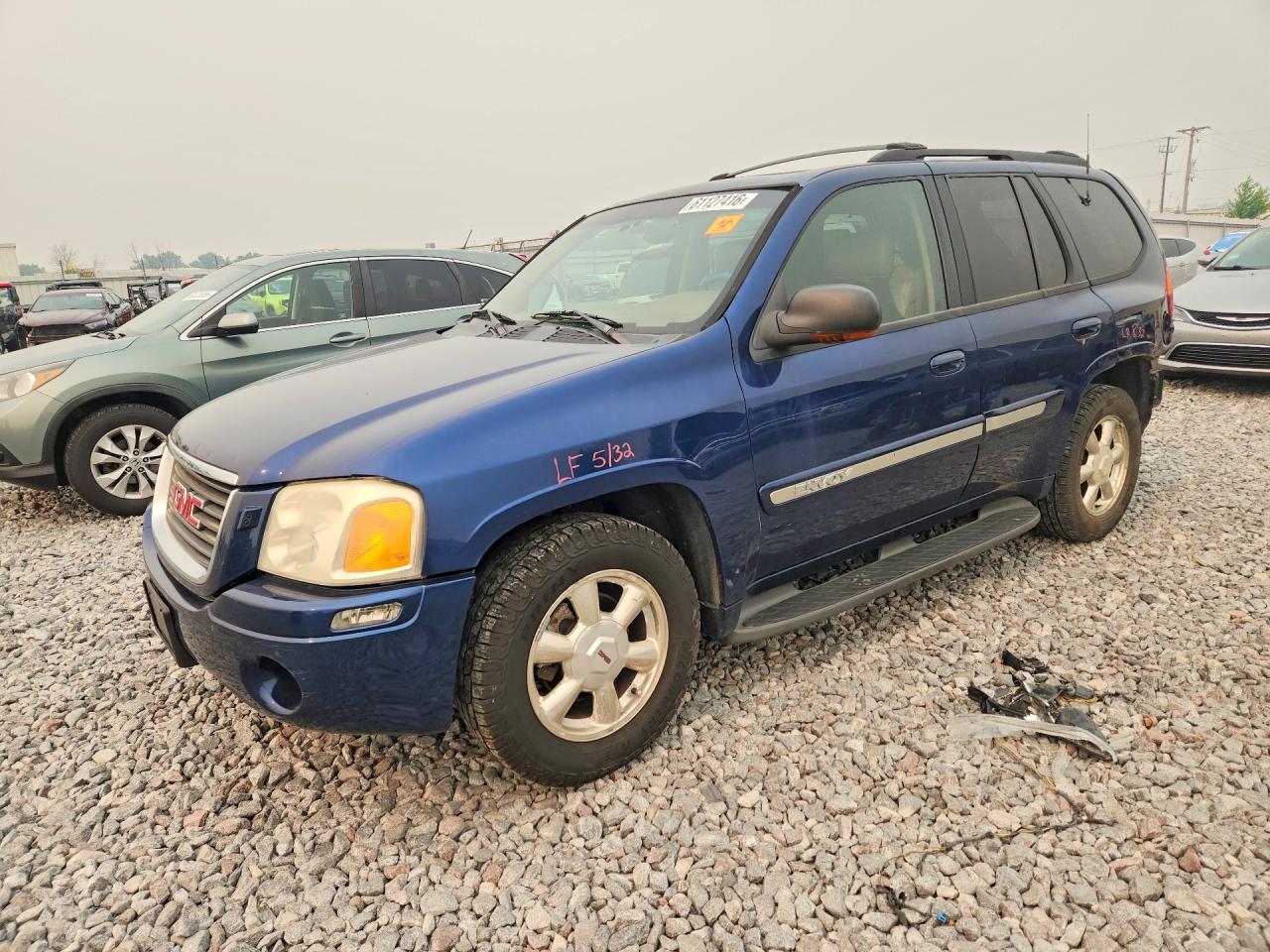 2002 GMC Envoy SLE, VIN 1GKDT13S922277351 — Rear end