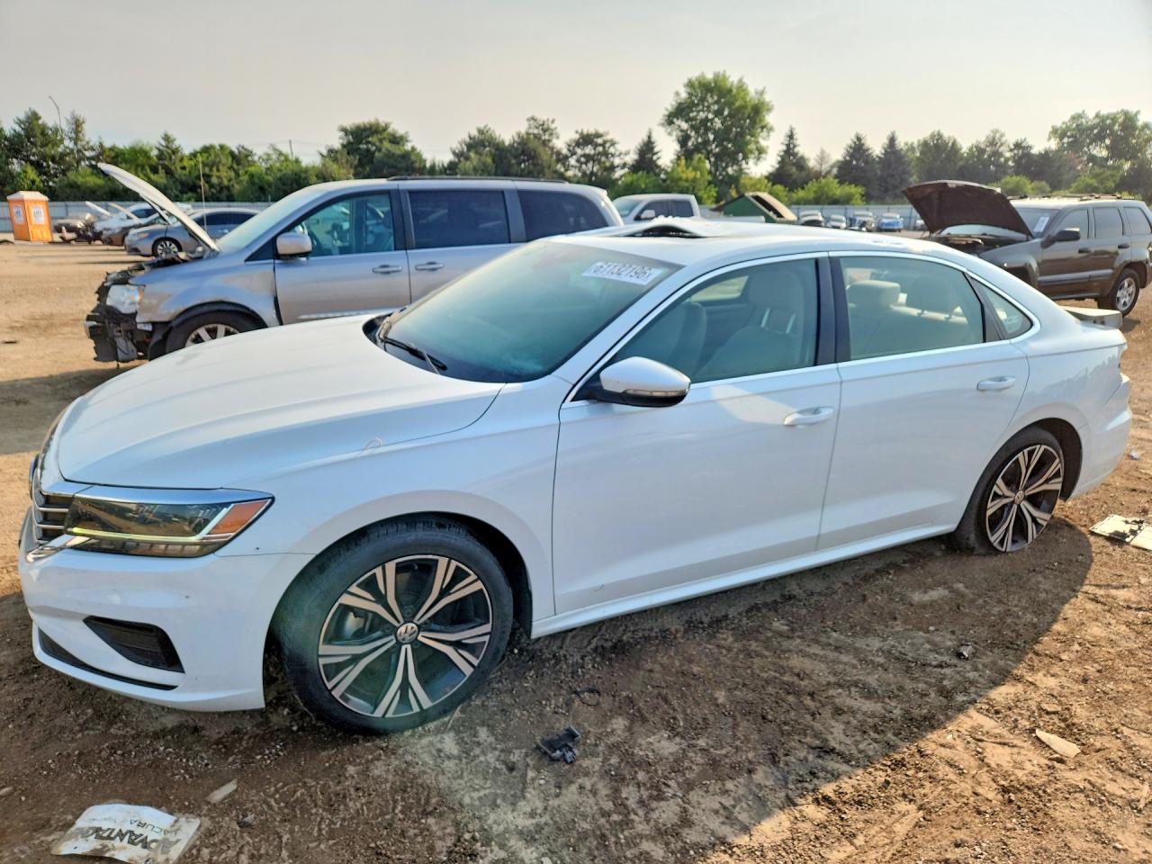 2021 Volkswagen Passat SE, VIN 1VWSA7A33MC003029 — Зад