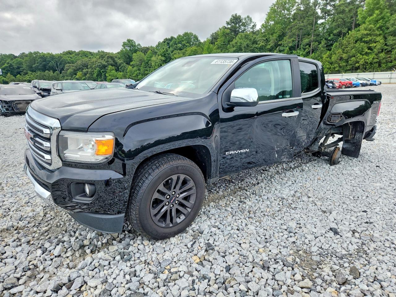 2017 GMC Canyon 4WD SLT, VIN 1GTG6DEN8H1307947 — Side