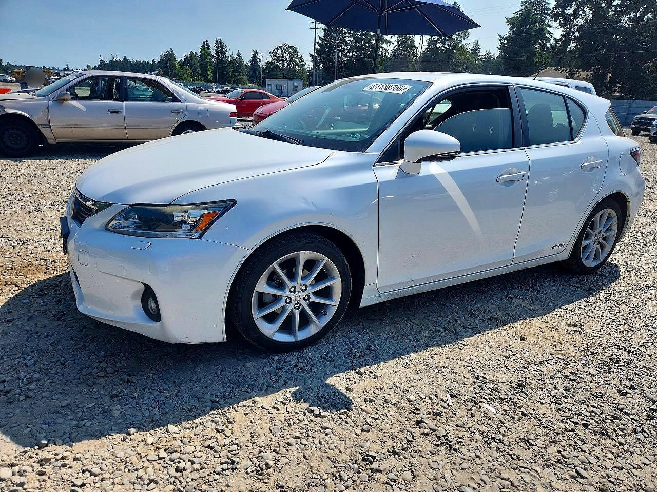 2012 Lexus CT 200h Premium, VIN JTHKD5BH8C2106877 — Side