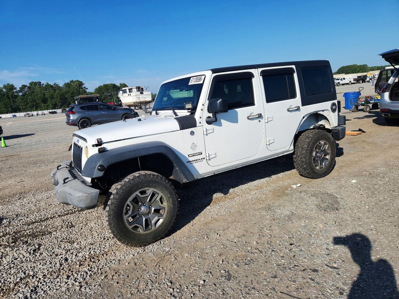 2015 Jeep Wrangler Unlimited Sport, VIN 1C4BJWDG0FL663124 — All over