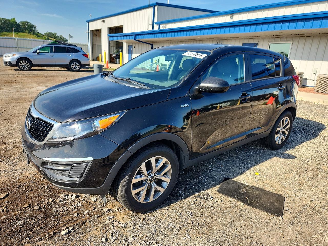 2015 Kia Sportage LX, VIN KNDPBCAC8F7739068 — Hail