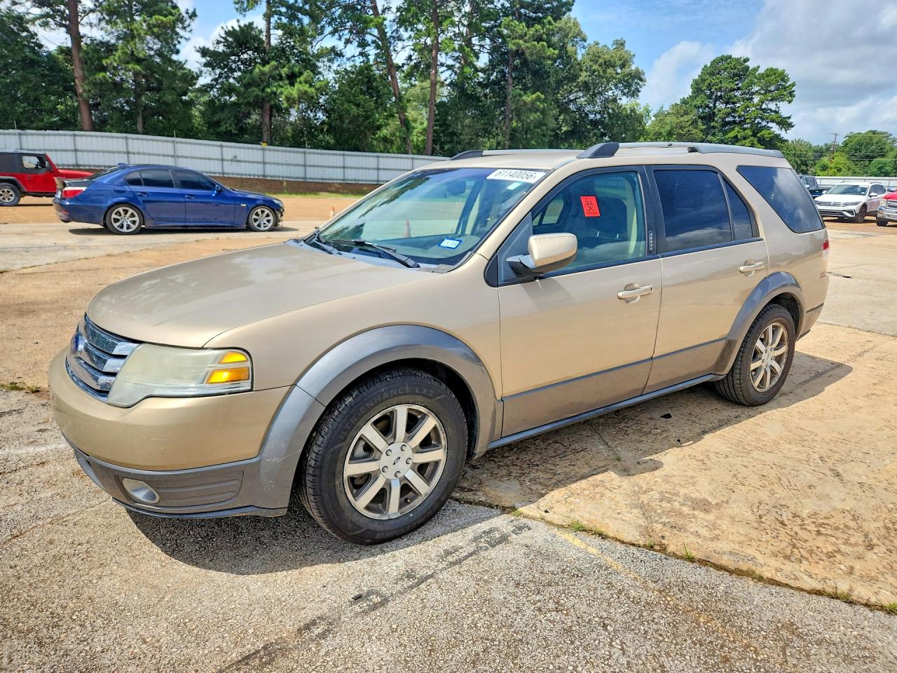 2008 Ford Taurus X SEL, VIN 1FMDK05W28GA00735 — Side