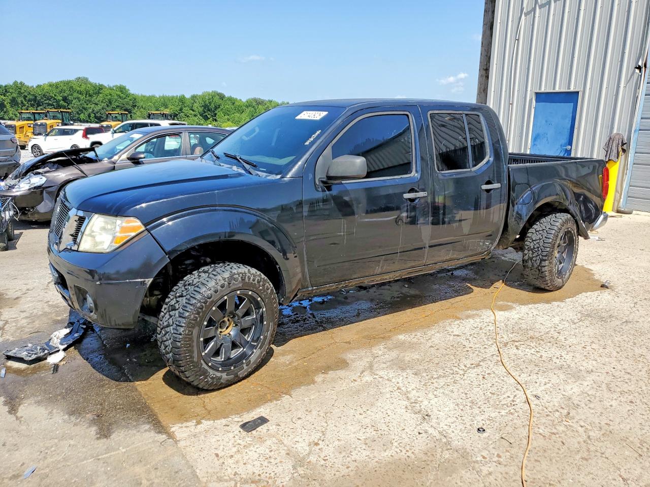 2013 Nissan Frontier Pro-4X, VIN 1N6AD0EV5DN728710 — Side