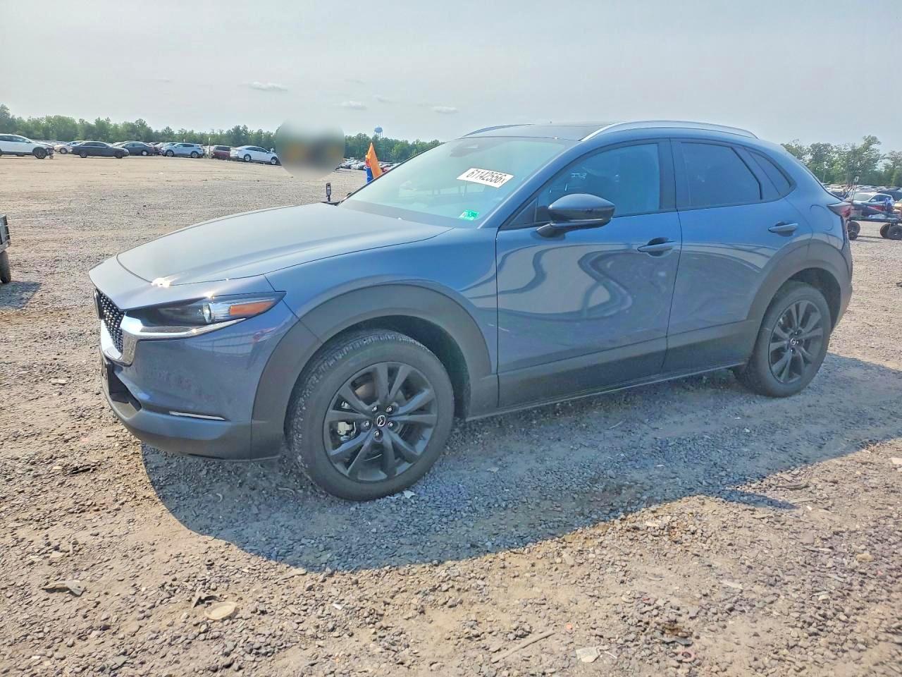 2026 Mazda CX-30 S Carbon Edition, VIN 3MVDMBCL9TM105174 — Rear end