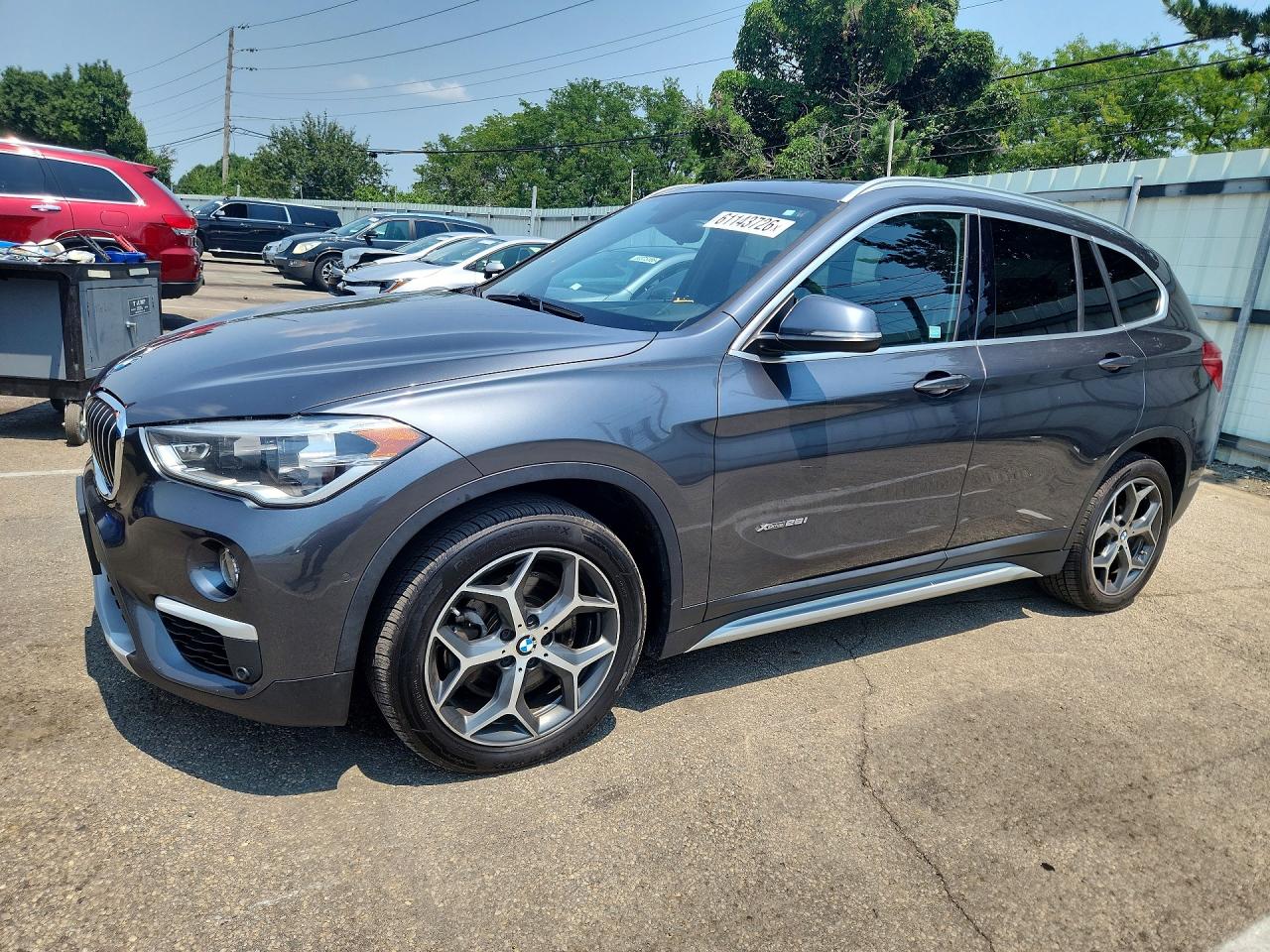 2018 BMW X1 xDrive28i, VIN WBXHT3C30J5K25396 — Normal wear