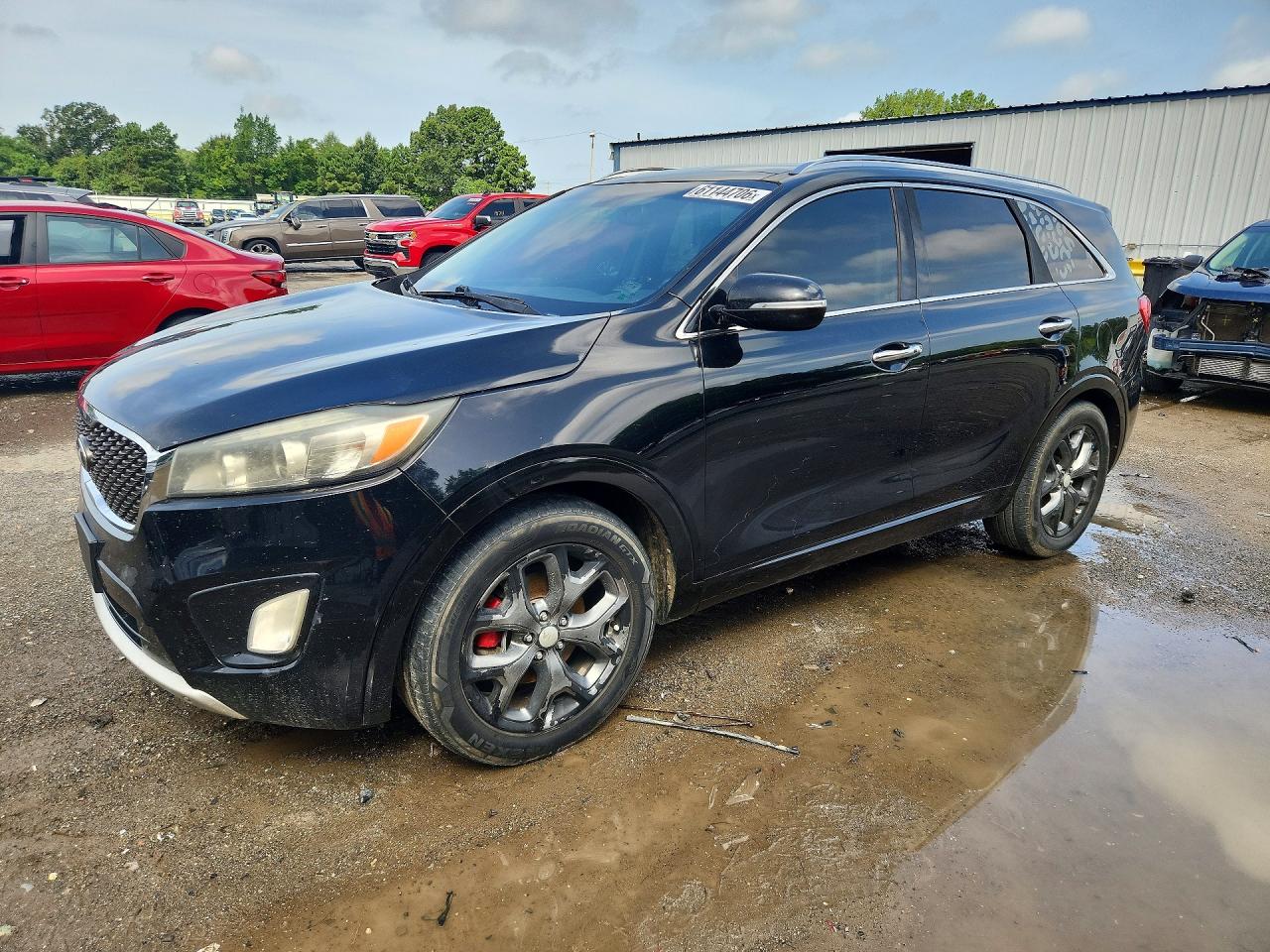 2016 Kia Sorento SX, VIN 5XYPK4A54GG079963 — Side
