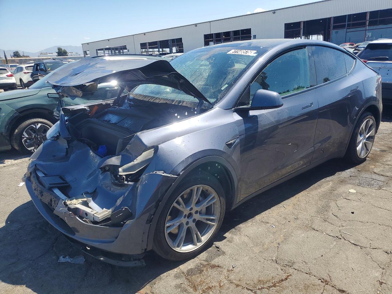 2023 Tesla Model Y Long Range, VIN 7SAYGDEE3PF639689 — Front end