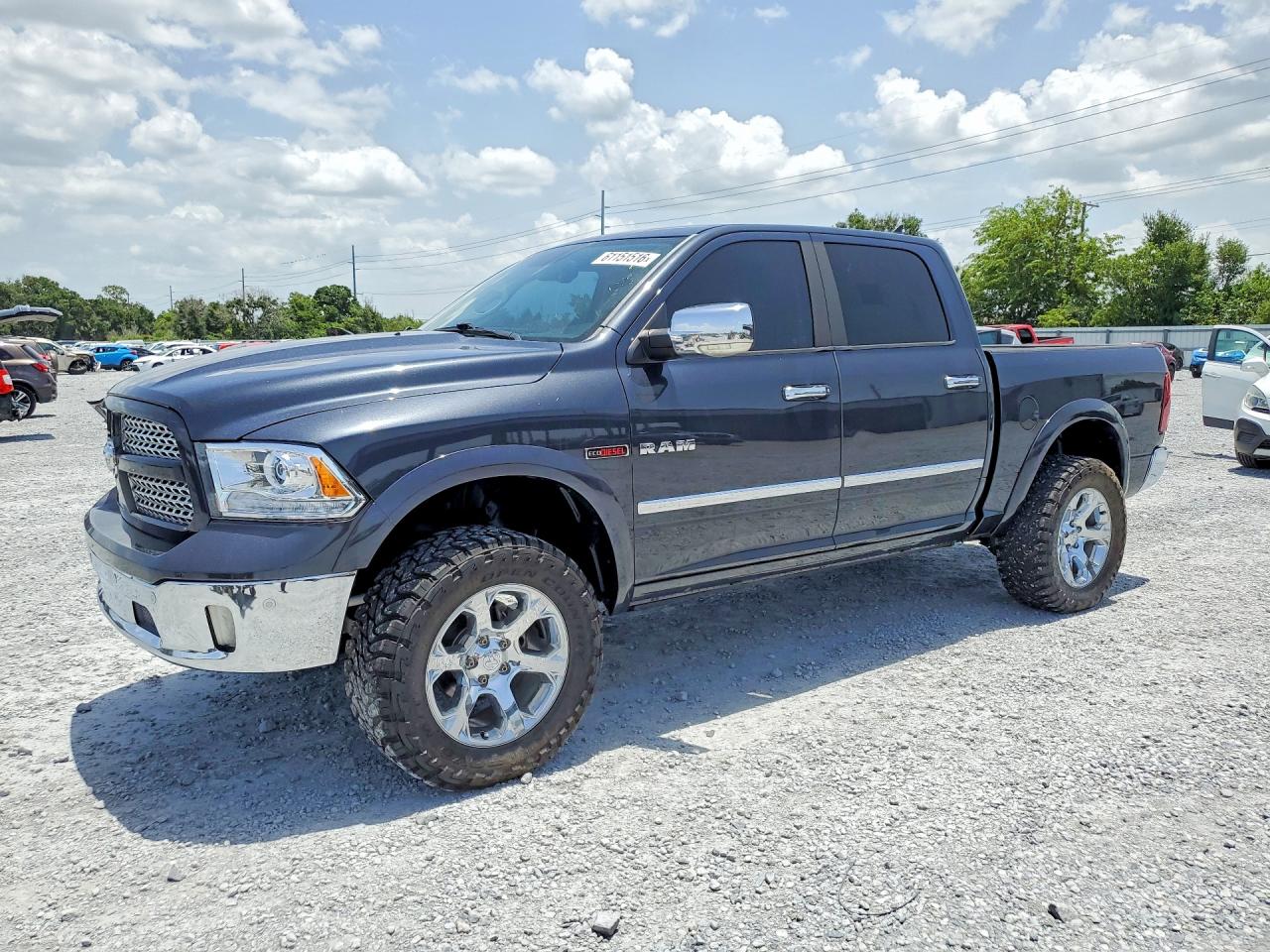 2016 Ram 1500 Laramie, VIN 1C6RR6NM4GS241982 — Minor dents and scratches