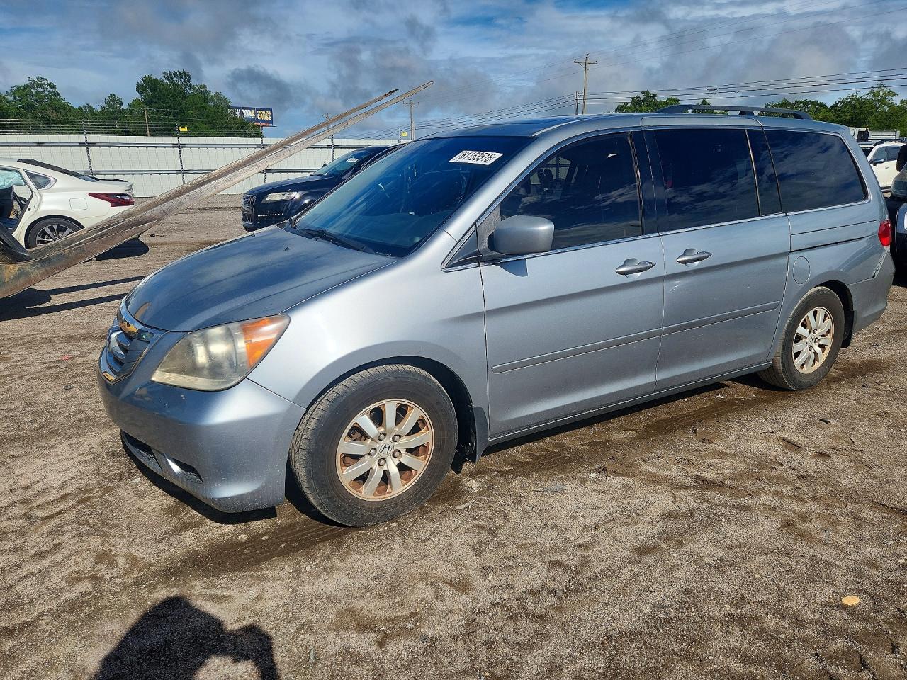 2010 Honda Odyssey EX-L, VIN 5FNRL3H77AB092874 — Rear end