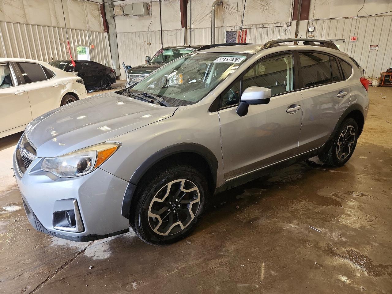 2016 Subaru Crosstrek Premium, VIN JF2GPABC9G8267996 — Бок