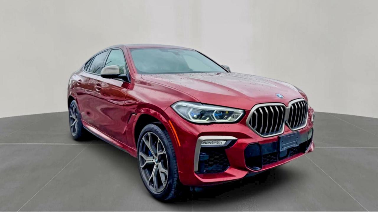 2021 BMW X6 M50i, VIN 5UXCY8C09M9E51267 — Auction photo