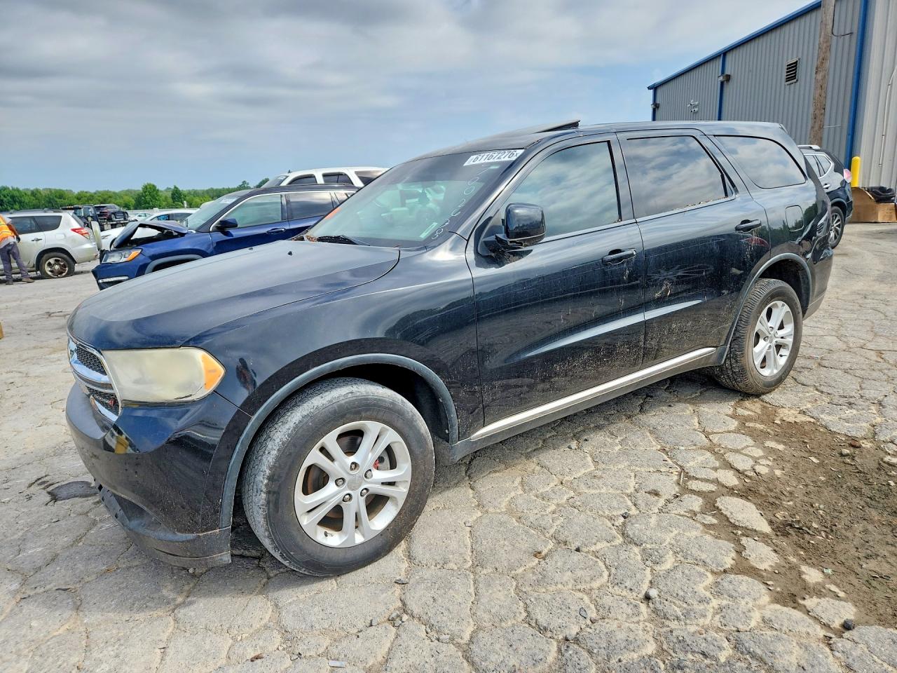 2012 Dodge Durango SXT, VIN 1C4RDHAG8CC301348 — Minor dents and scratches