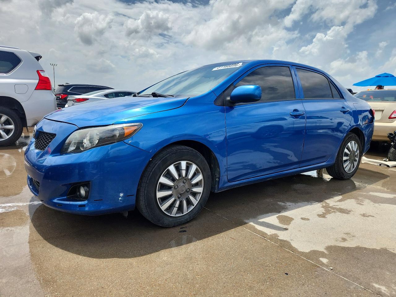 2010 Toyota Corolla LE, VIN 1NXBU4EE2AZ339809 — Rear end