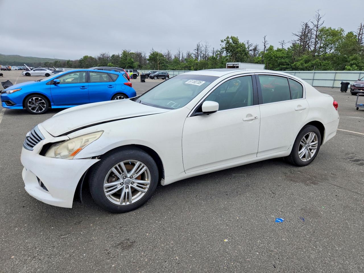 2011 Infiniti G25 x, VIN JN1DV6AR1BM450628 — Side