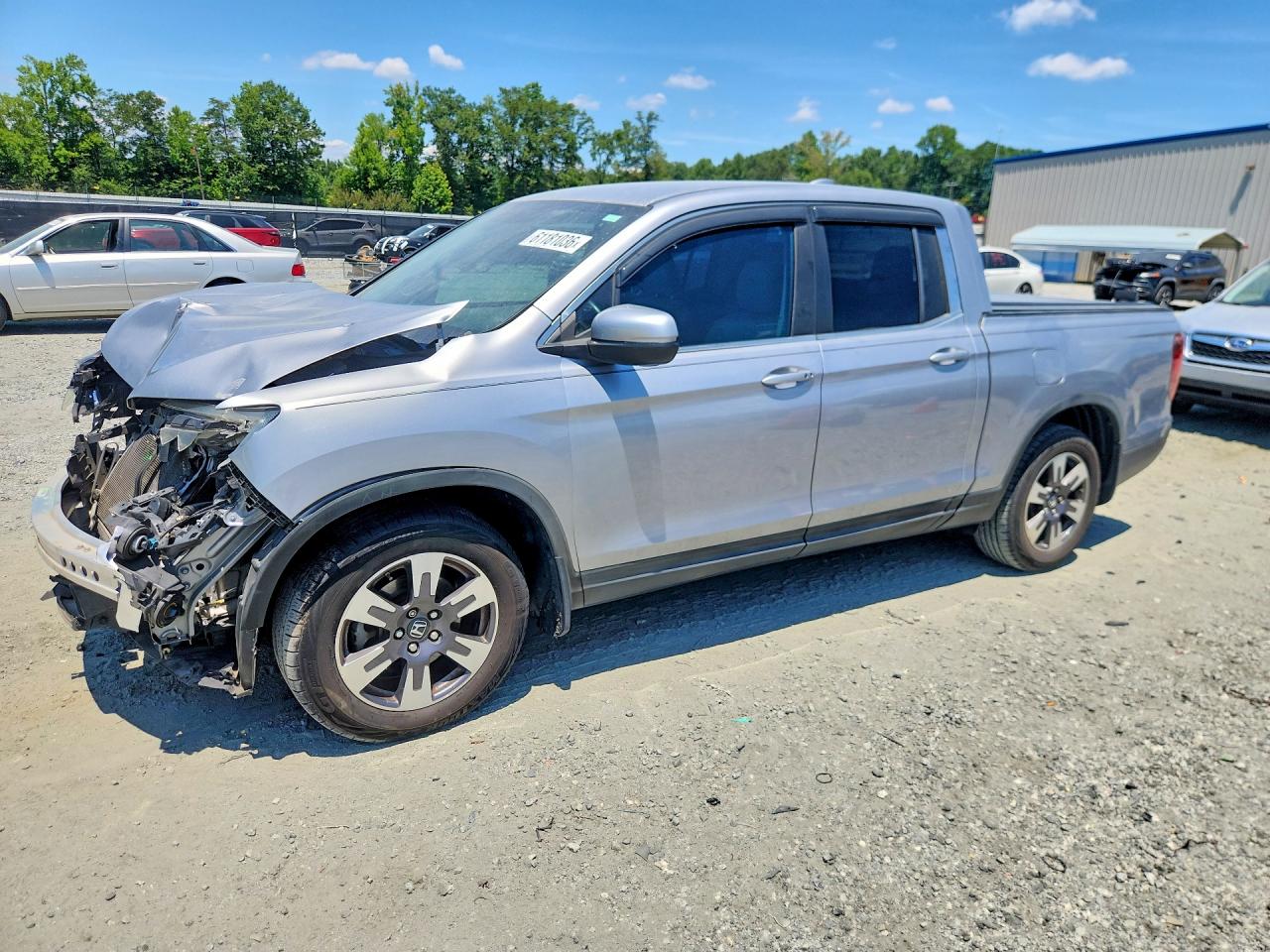 2017 Honda Ridgeline RTL-T, VIN 5FPYK2F65HB006465 — Front end
