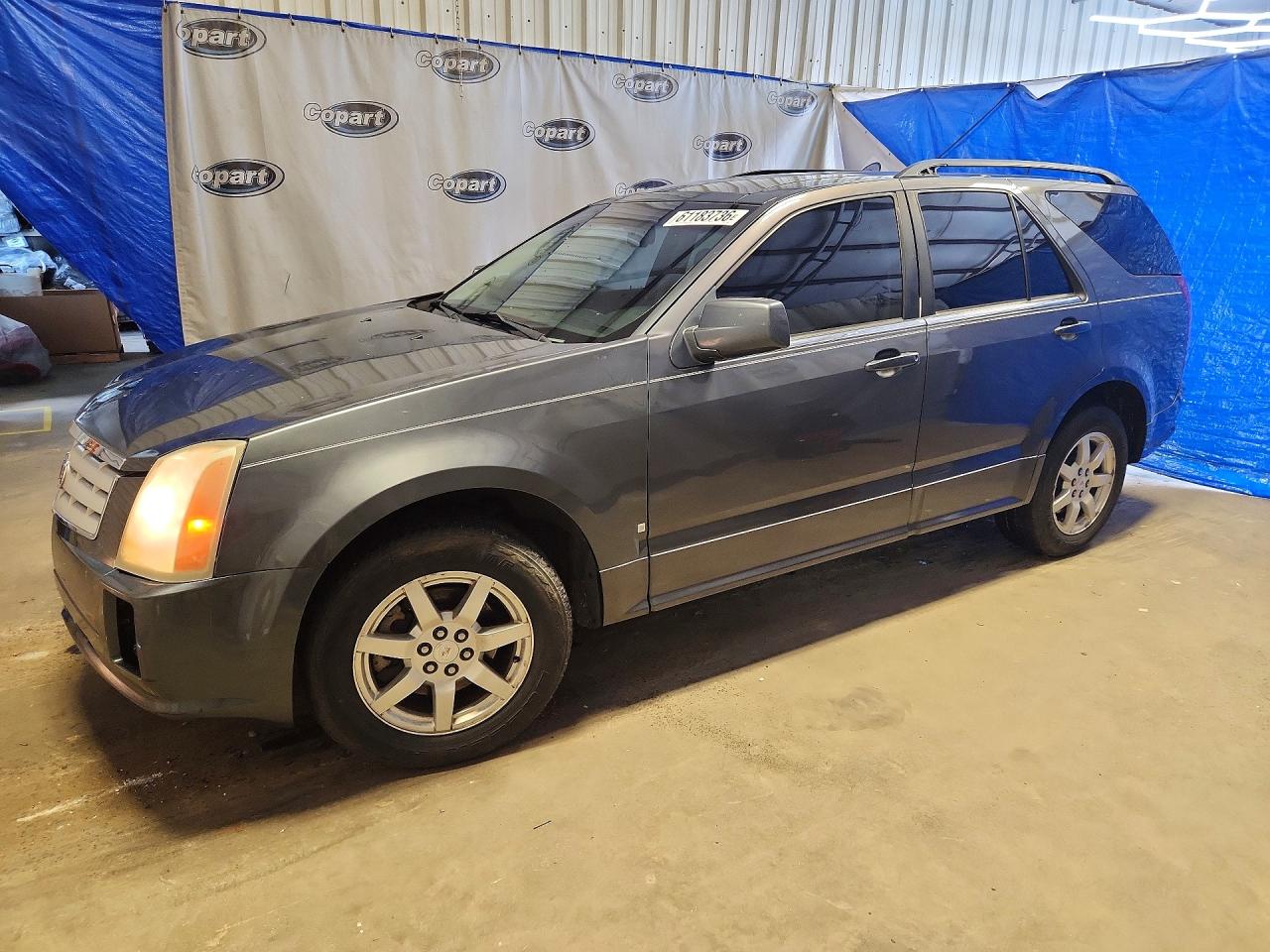 2009 Cadillac SRX RWD, VIN 1GYEE637990111480 — Front end