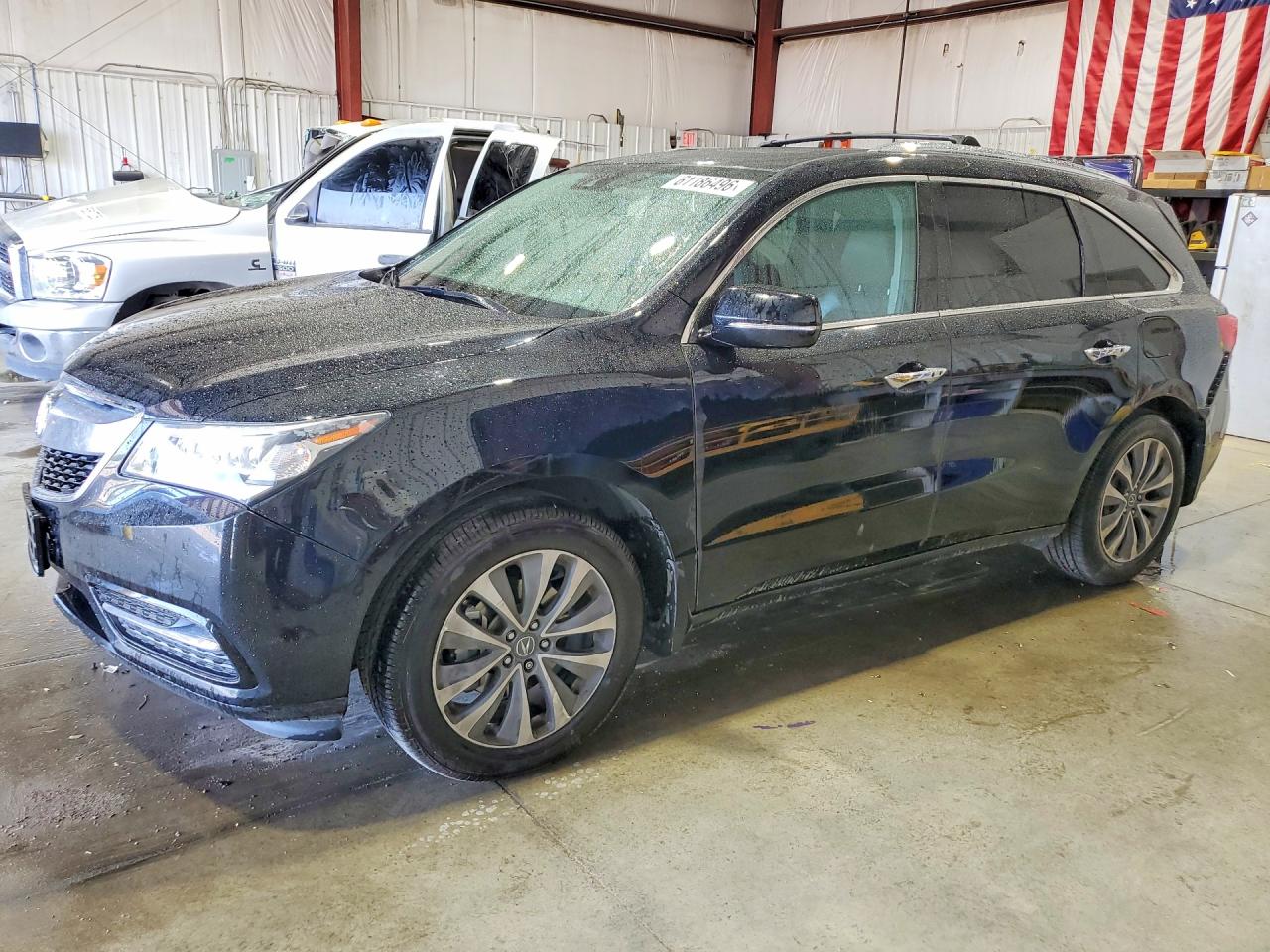2016 Acura MDX Technology, VIN 5FRYD4H43GB038984 — Rear end