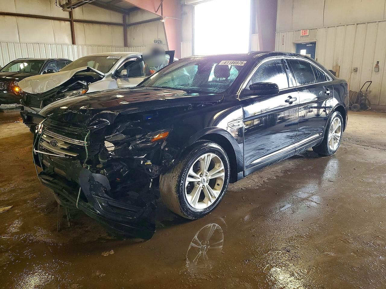 2017 Ford Taurus SEL, VIN 1FAHP2E80HG133214 — Front end