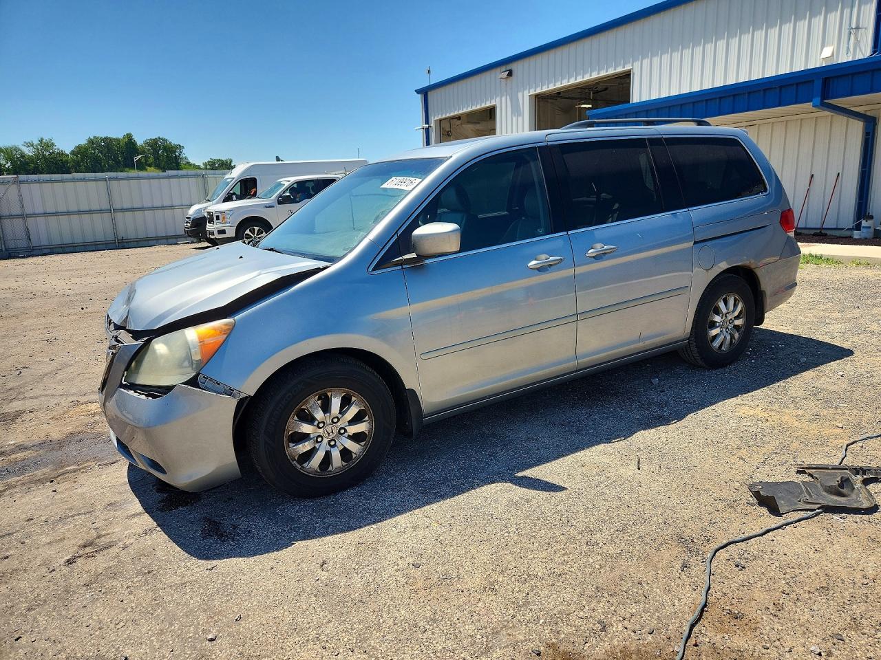 2010 Honda Odyssey EX-L, VIN 5FNRL3H77AB042234 — Front end