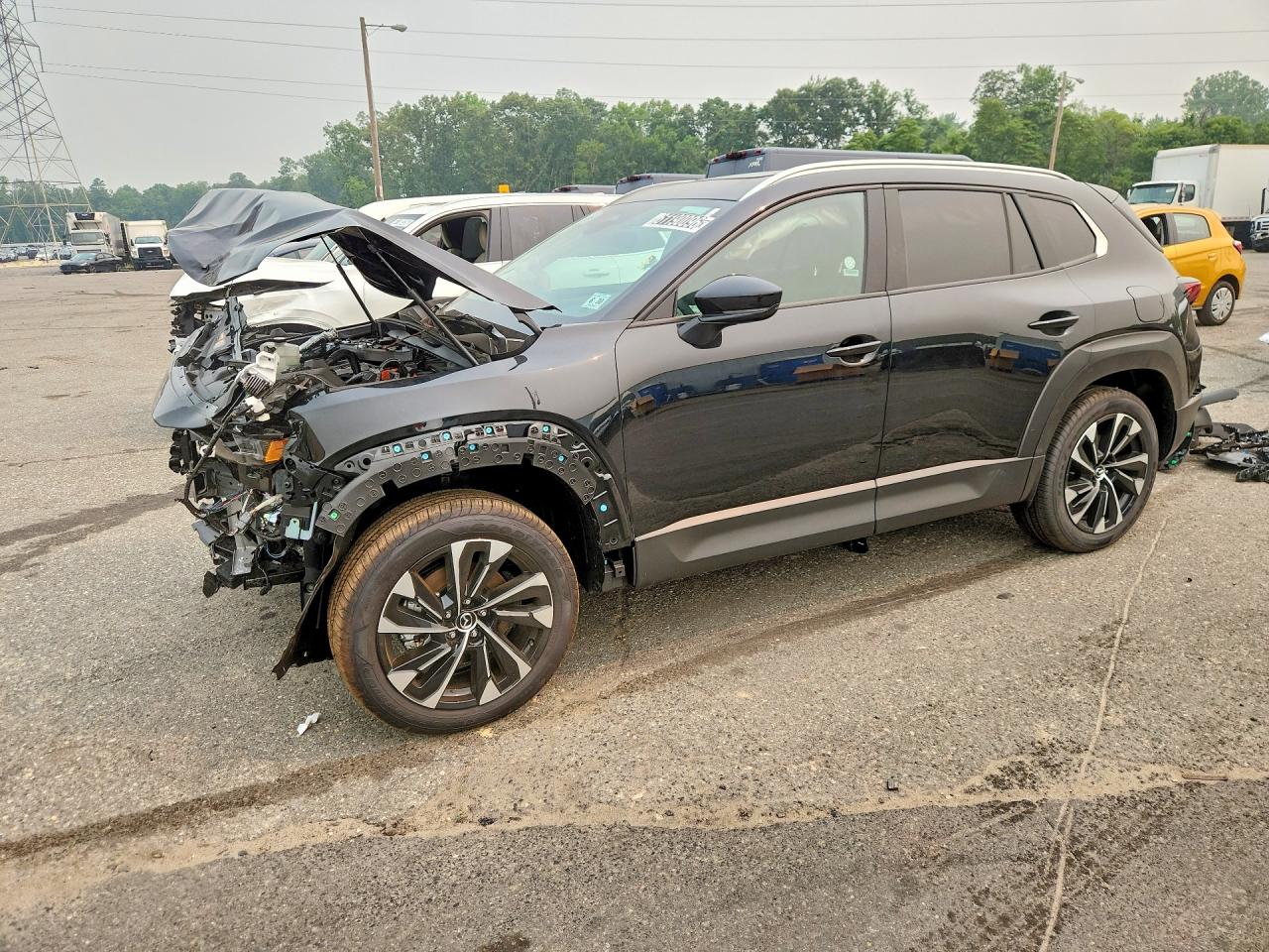 2026 Mazda CX-50 Hybrid Premium Plus, VIN 7MMVAAEW8TN176212 — Front end