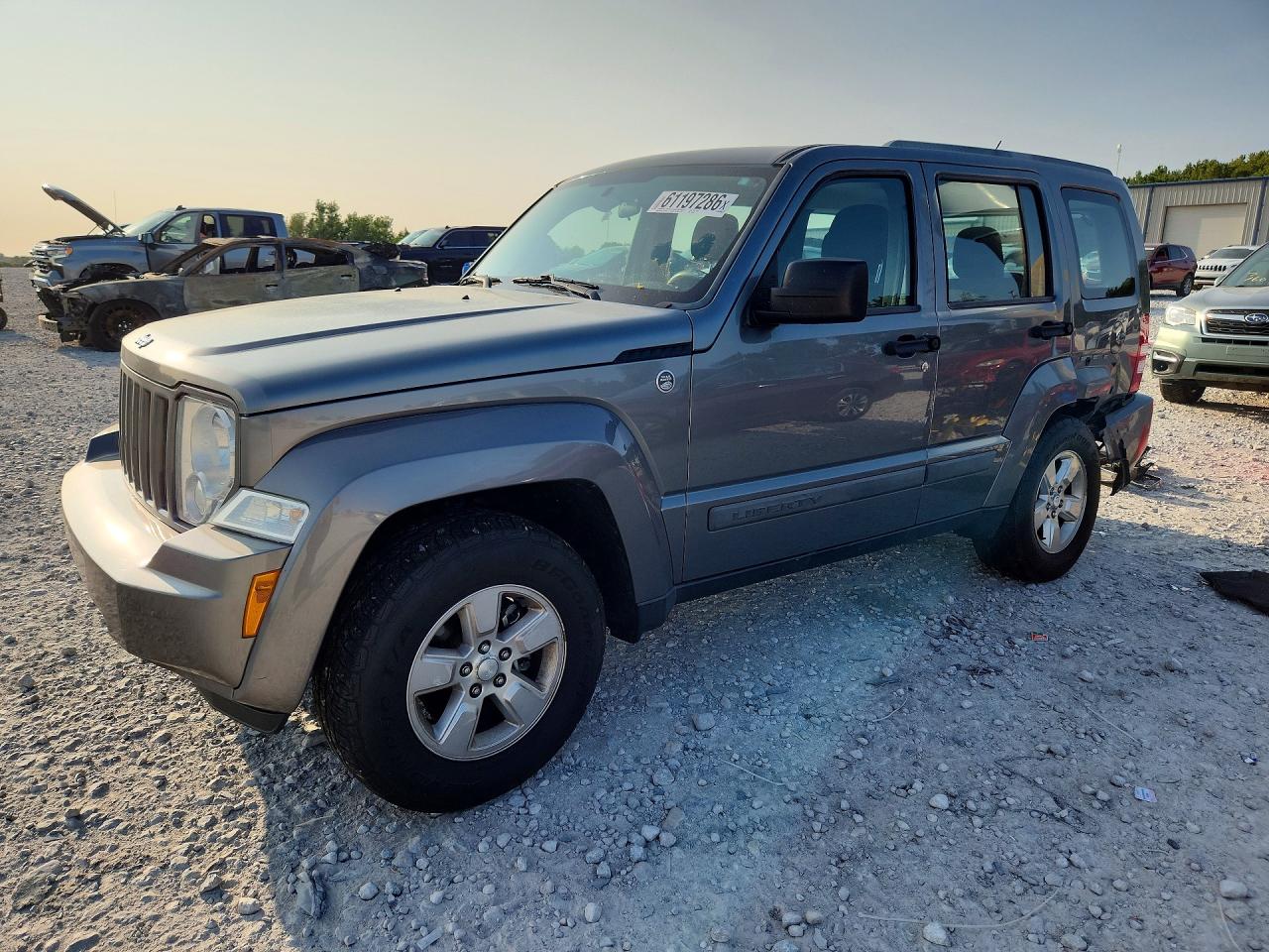 2012 Jeep Liberty Sport, VIN 1C4PJMAKXCW134258 — Бок