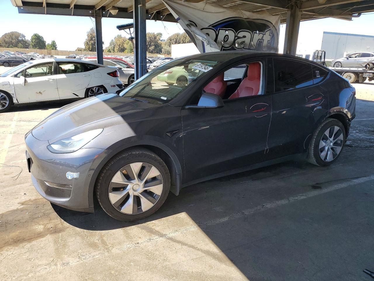2021 Tesla Model Y Long Range, VIN 5YJYGDEE0MF273912 — Rear end