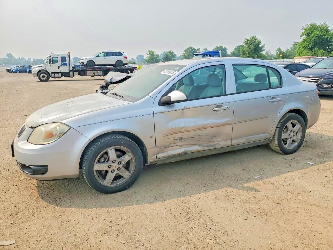 2008 Pontiac G5, VIN 1G2AL55F687171333 — Side