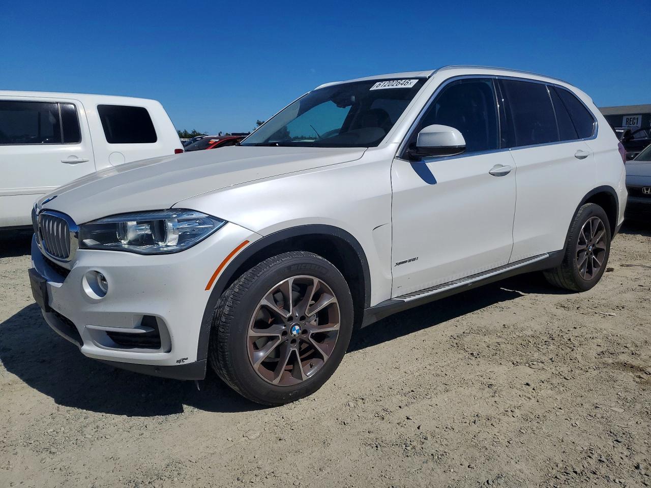 2014 BMW X5 xDrive35i, VIN 5UXKR0C5XE0H24325 — Мелкие вмятины и царапины