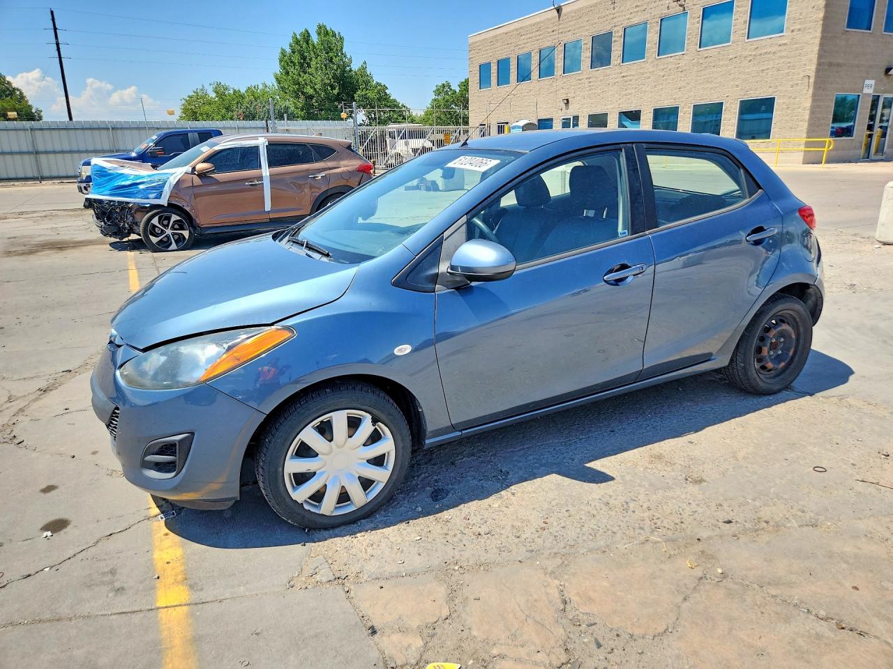 2014 Mazda 2 Sport, VIN JM1DE1KZ0E0189020 — Front end