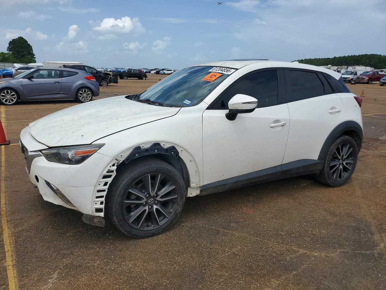 2017 Mazda CX-3 Touring, VIN JM1DKFC77H0162209 — Front end