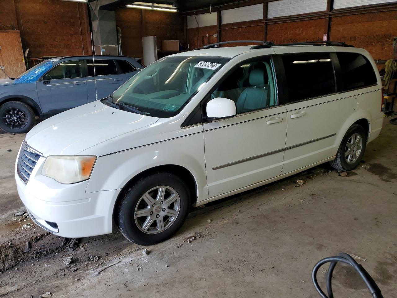 2010 Chrysler Town & Country Touring, VIN 2A4RR5D11AR305442 — Water / flood