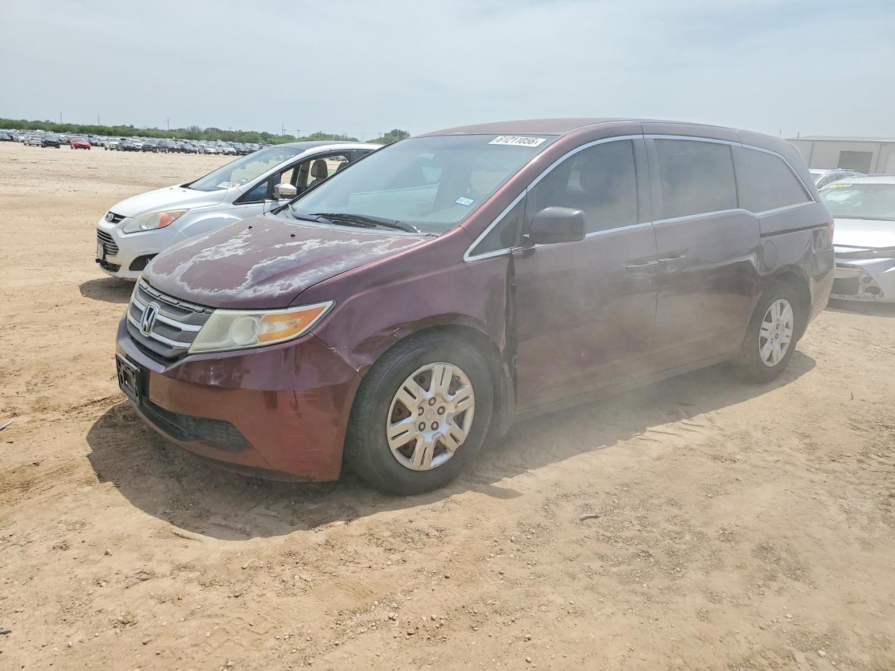 2011 Honda Odyssey LX, VIN 5FNRL5H24BB083485 — Front end