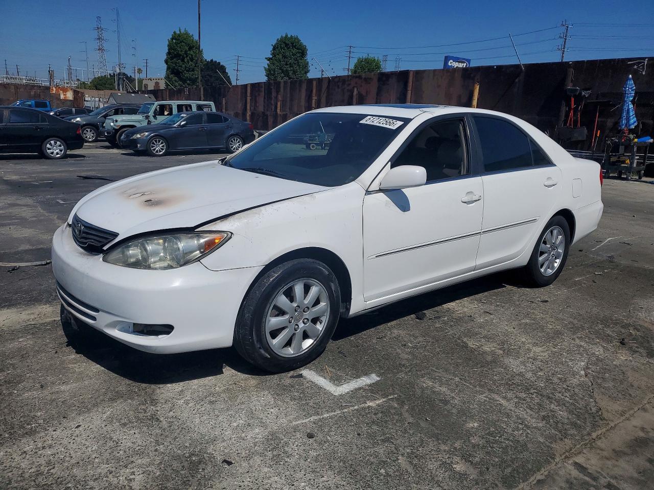 2004 Toyota Camry XLE, VIN JTDBF32K240152696 — Engine fire