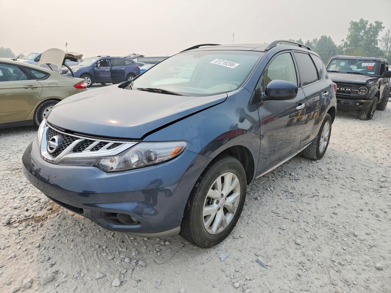 2014 Nissan Murano SL, VIN JN8AZ1MW5EW527717 — Vandalism