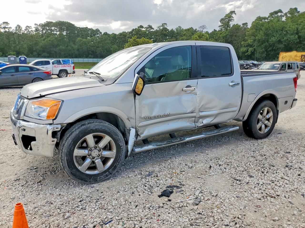 2009 Nissan Titan LE, VIN 1N6BA07D89N308464 — Side