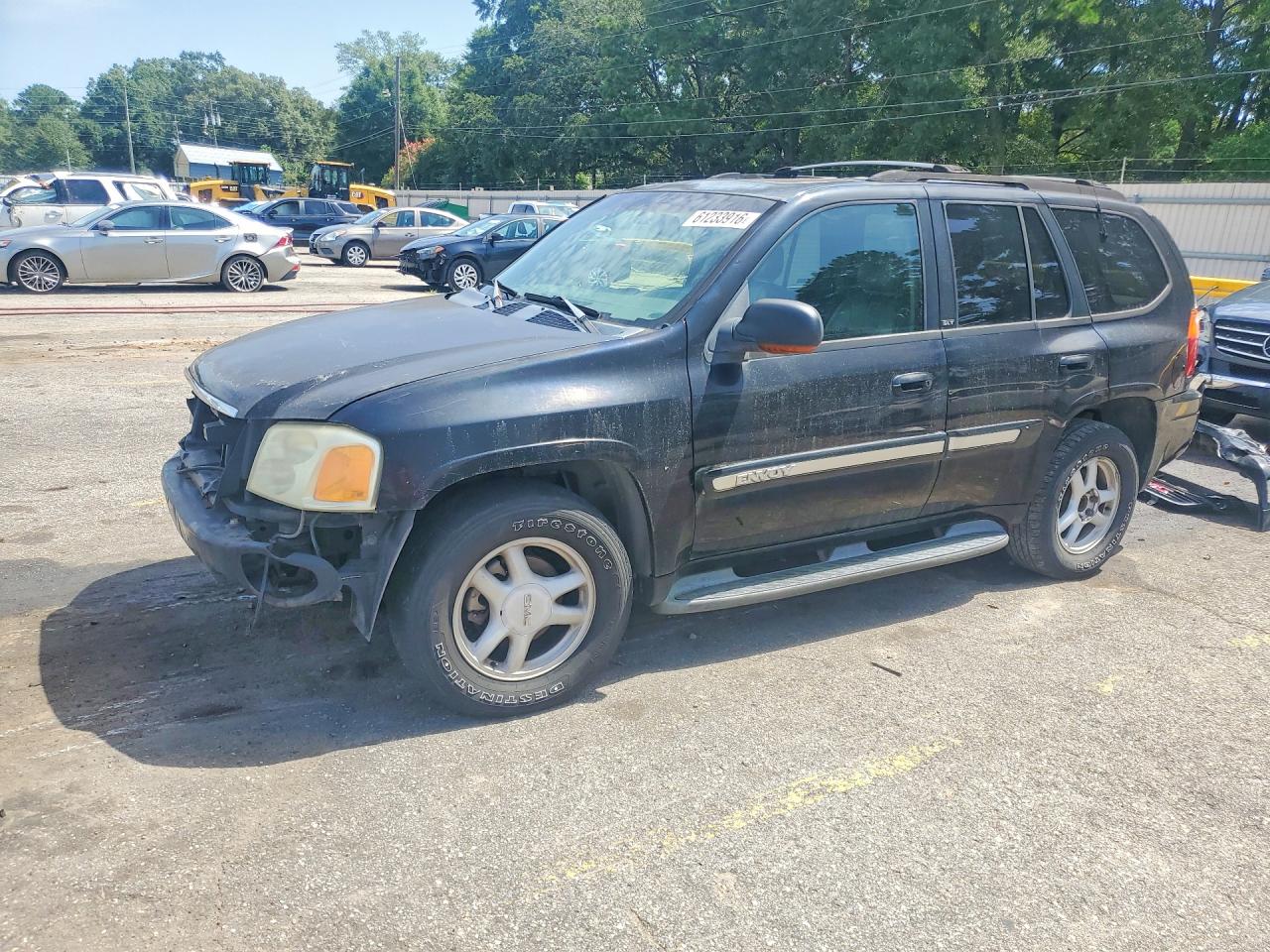 2002 GMC Envoy SLT, VIN 1GKDS13S122496663 — Front end