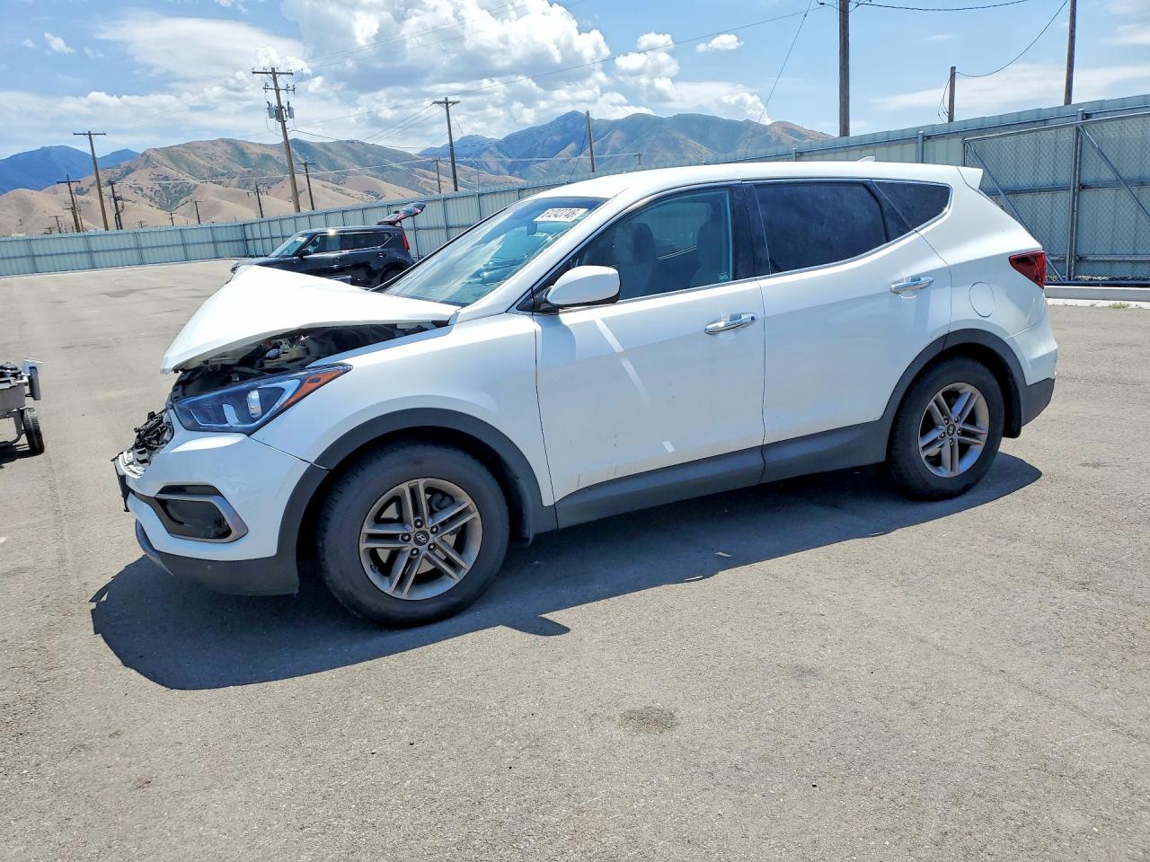 2017 Hyundai Santa Fe 2.4L, VIN 5NMZT3LB4HH026576 — Front end