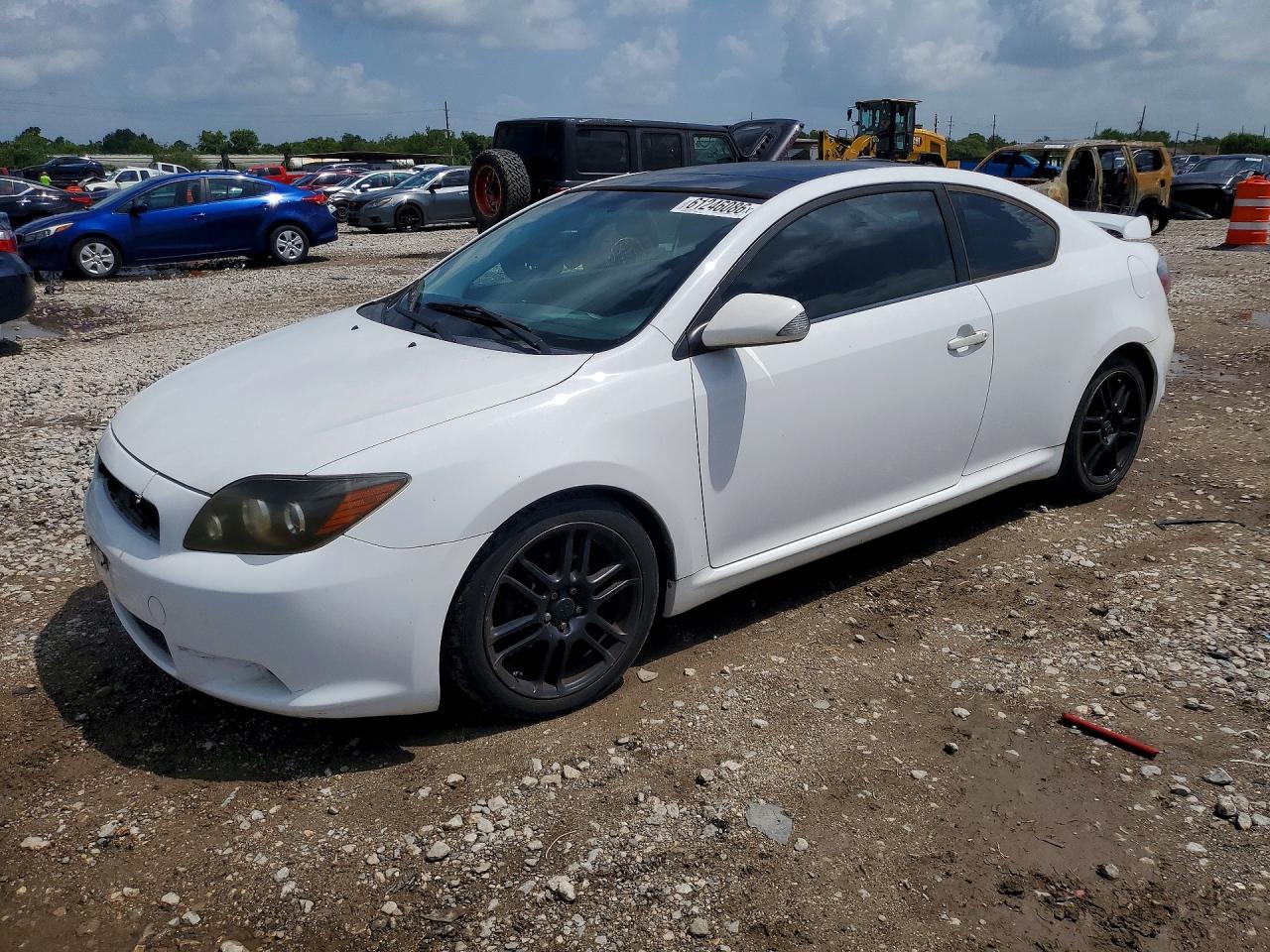 2009 Scion tC, VIN JTKDE167990290175 — Мелкие вмятины и царапины