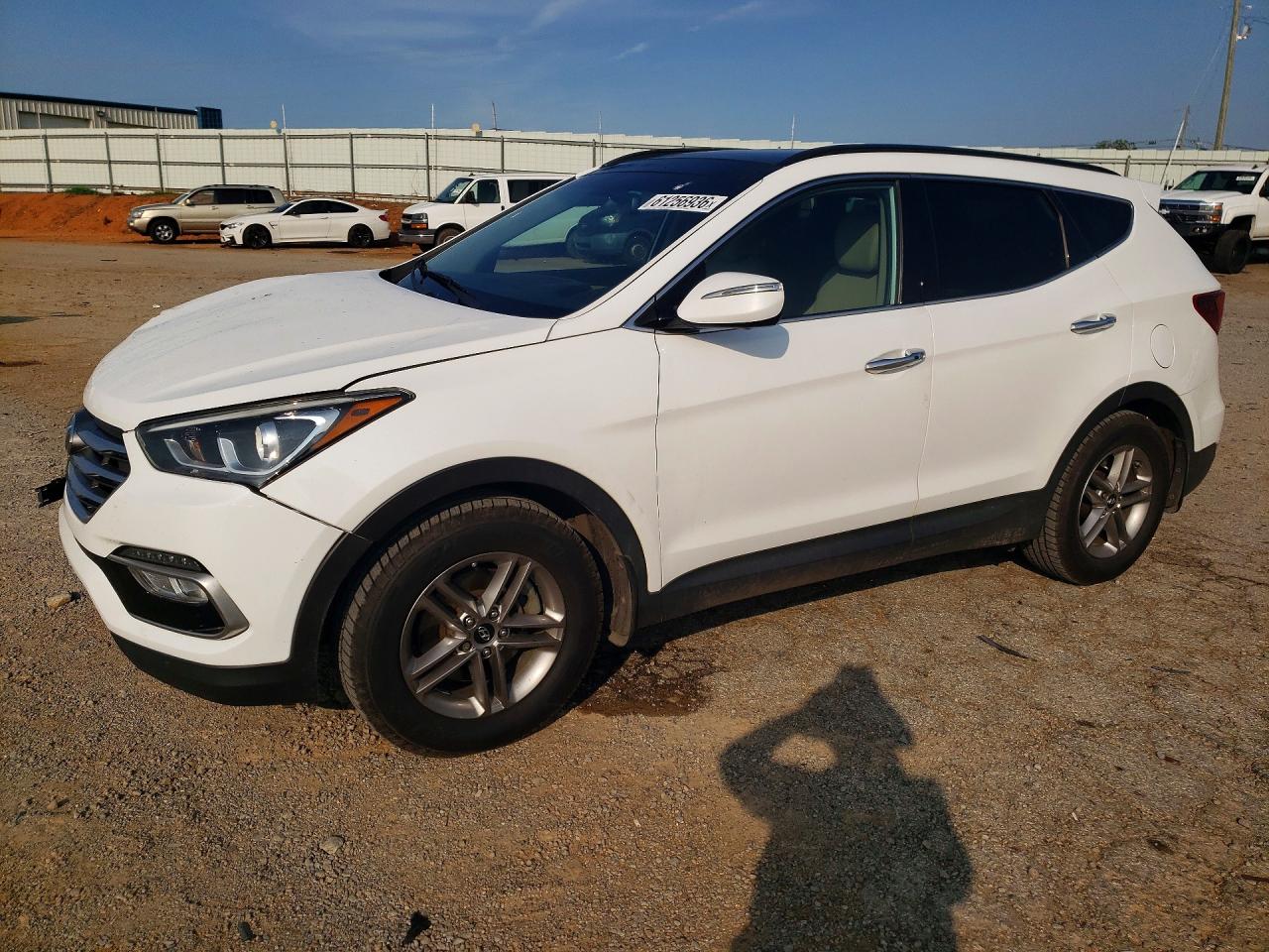 2017 Hyundai Santa Fe 2.4L, VIN 5XYZU3LB9HG457695 — Front end
