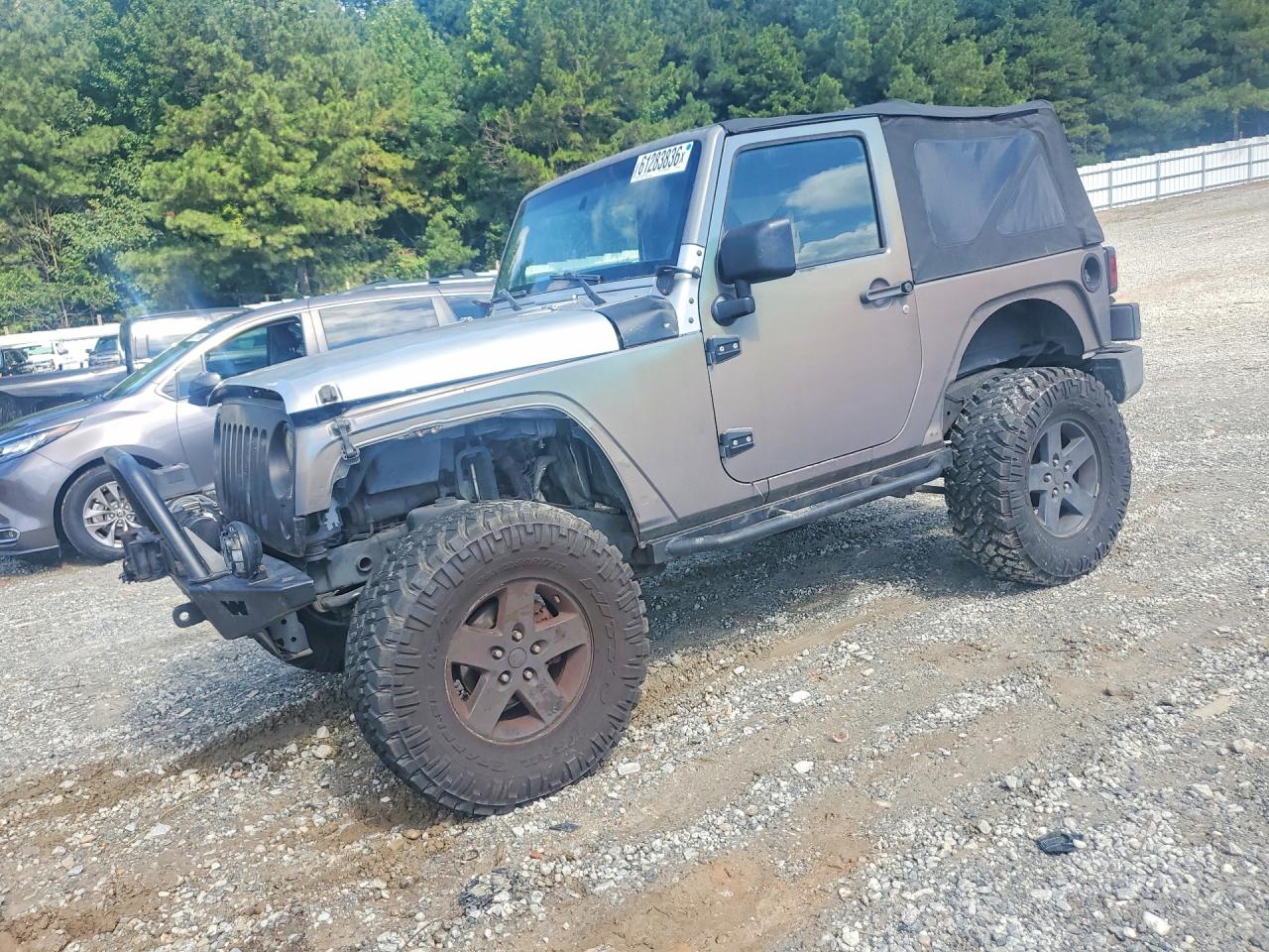 2011 Jeep Wrangler Sport, VIN 1J4AA2D1XBL505166 — Undercarriage