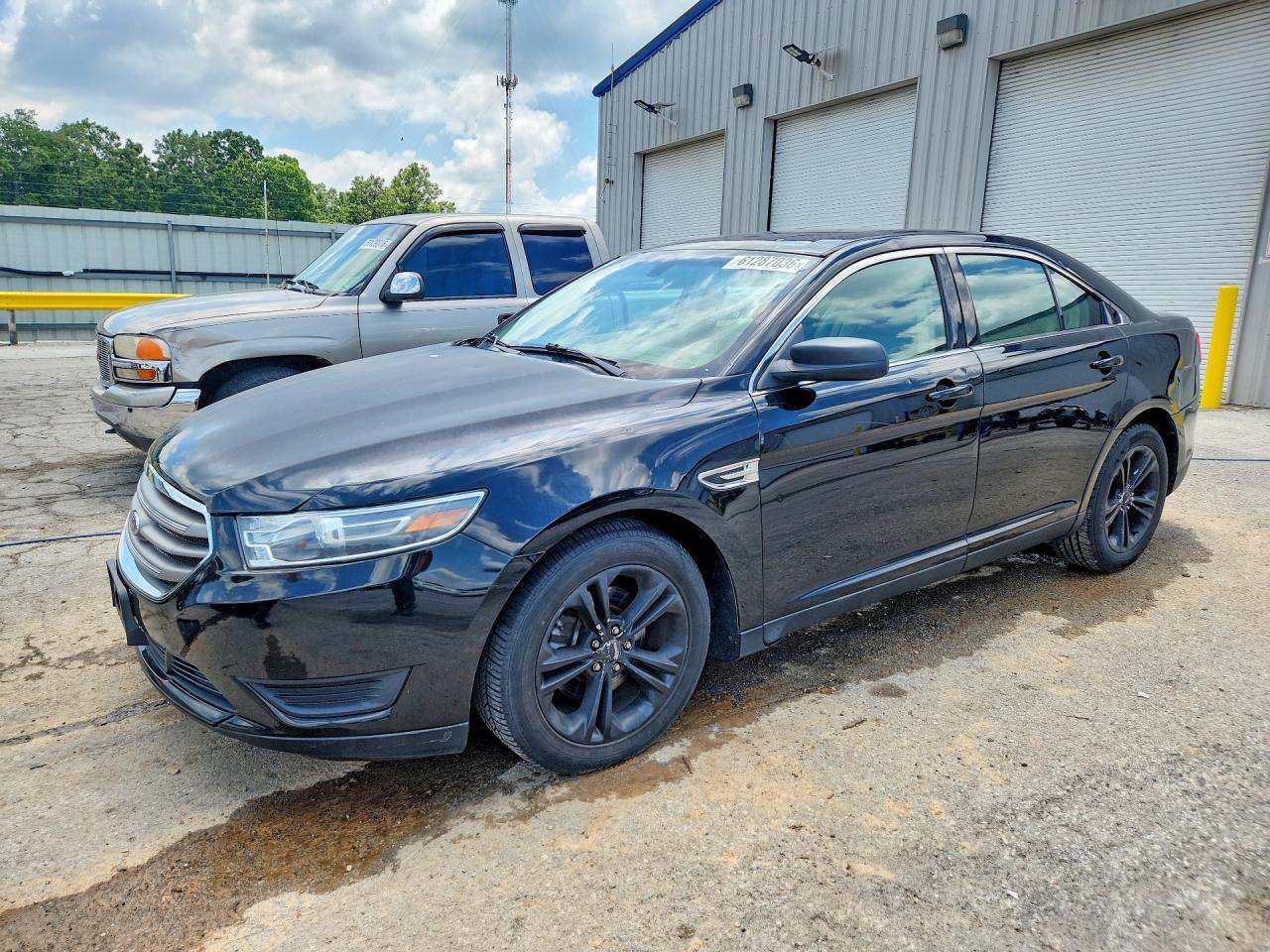 2018 Ford Taurus SE, VIN 1FAHP2D82JG104059 — Hail